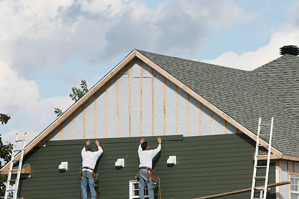 Professional Siding Installation technician working in Benwood, WV